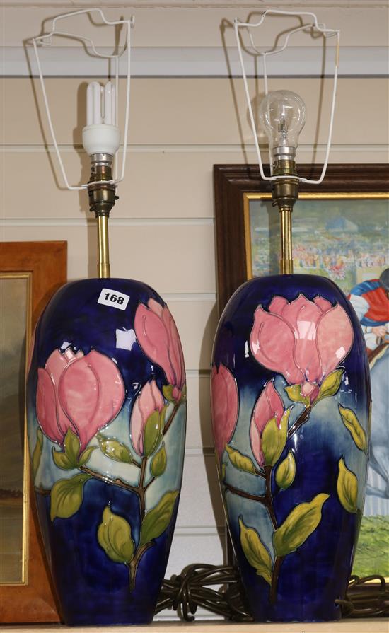 A pair of Moorcroft magnolia pattern table lamps